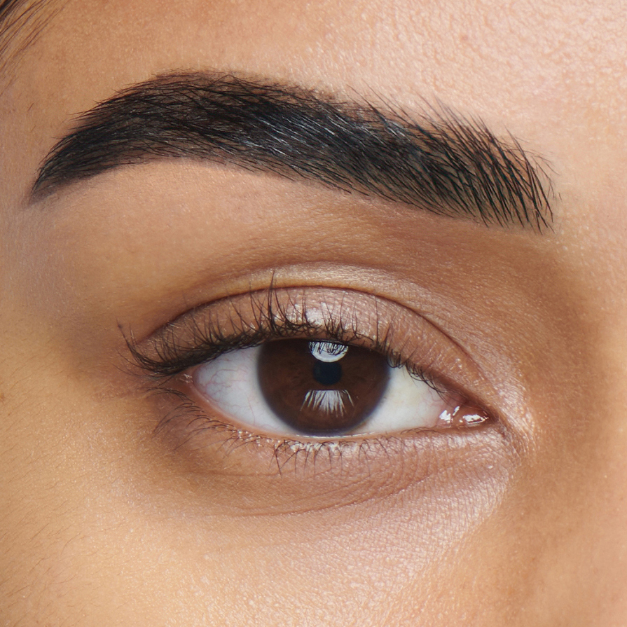 A close-up of a woman's eyebrow after treatment